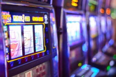 Mobile phone displaying dollar138 betting interface with Liga 1 matches and live-dealer tables