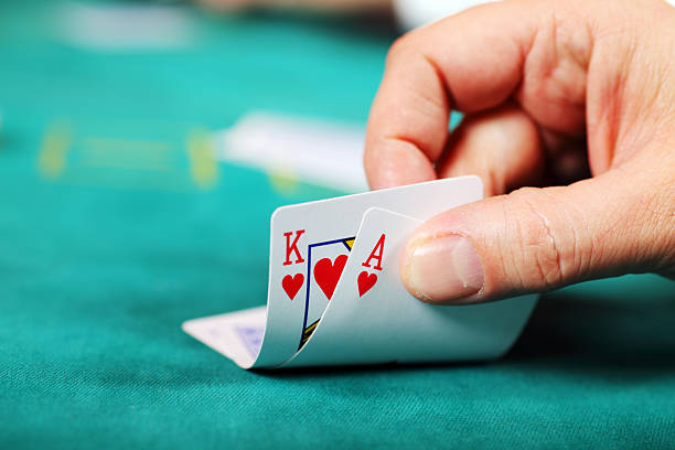 Close-up of dealer hands dealing cards in live game